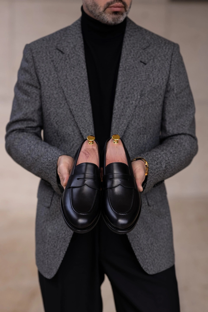 Skolyx sorte penny loafers